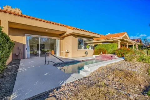 a view of a city with mountains in the background