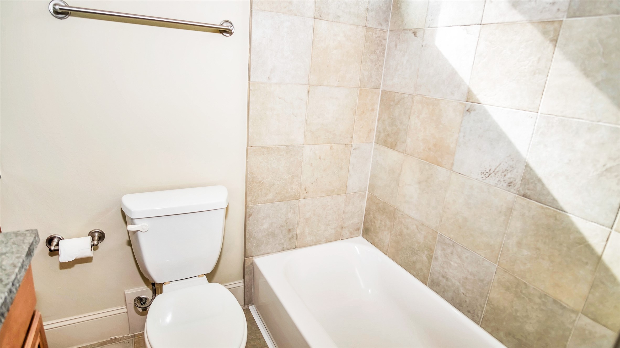 1611 Silver Street Houston, TX 77007 - Photo 25 of 32 a bathroom with a toilet and a shower