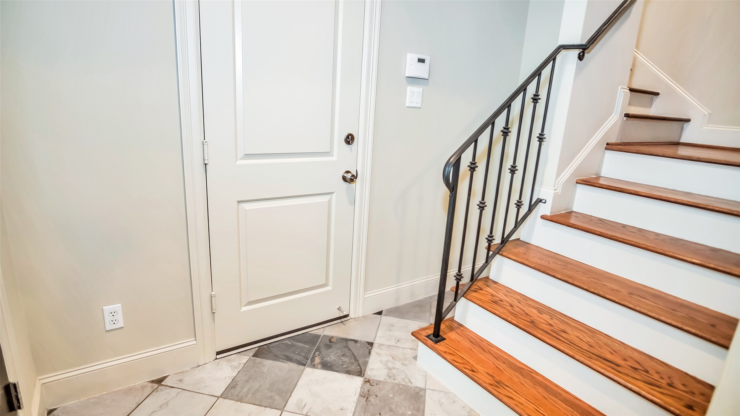 1611 Silver Street Houston, TX 77007 - Photo 26 of 32 a view of entryway with wooden floor and stairs