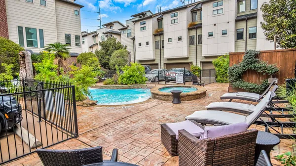 a view of a swimming pool with a sitting space