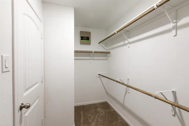 a view of a hallway with staircase