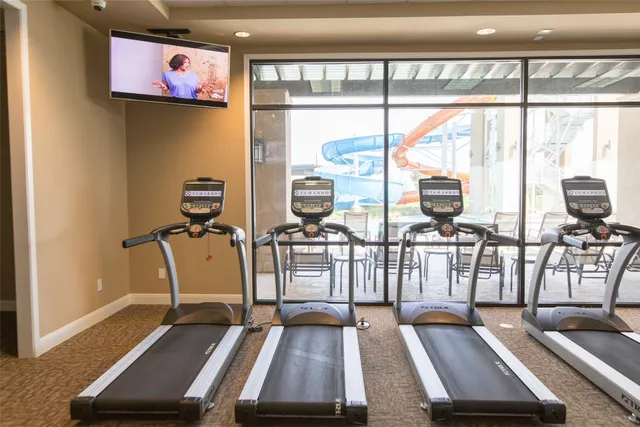 a view of a room with gym equipment