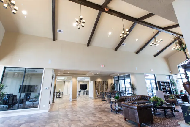 a view of a living room and entryway