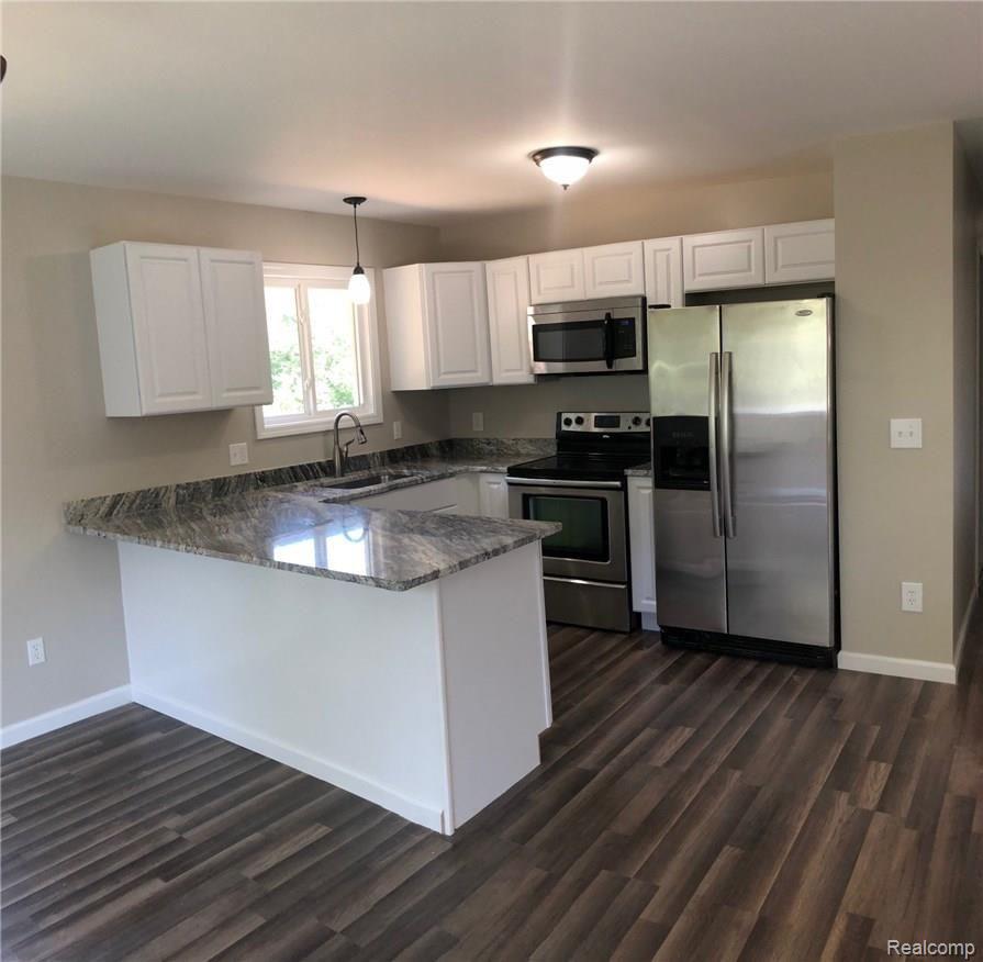 5550 Hinchey Road Howell, MI 48843 - Photo 3 of 16 H. Kitchen