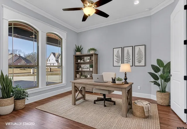 a workspace with furniture window and wooden floor