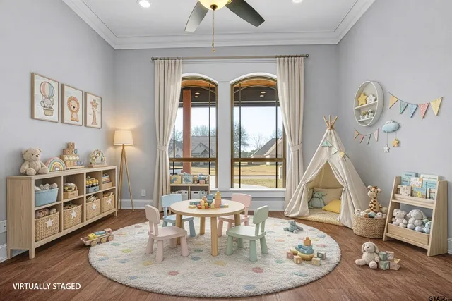 a view of a livingroom with furniture window and wooden floor