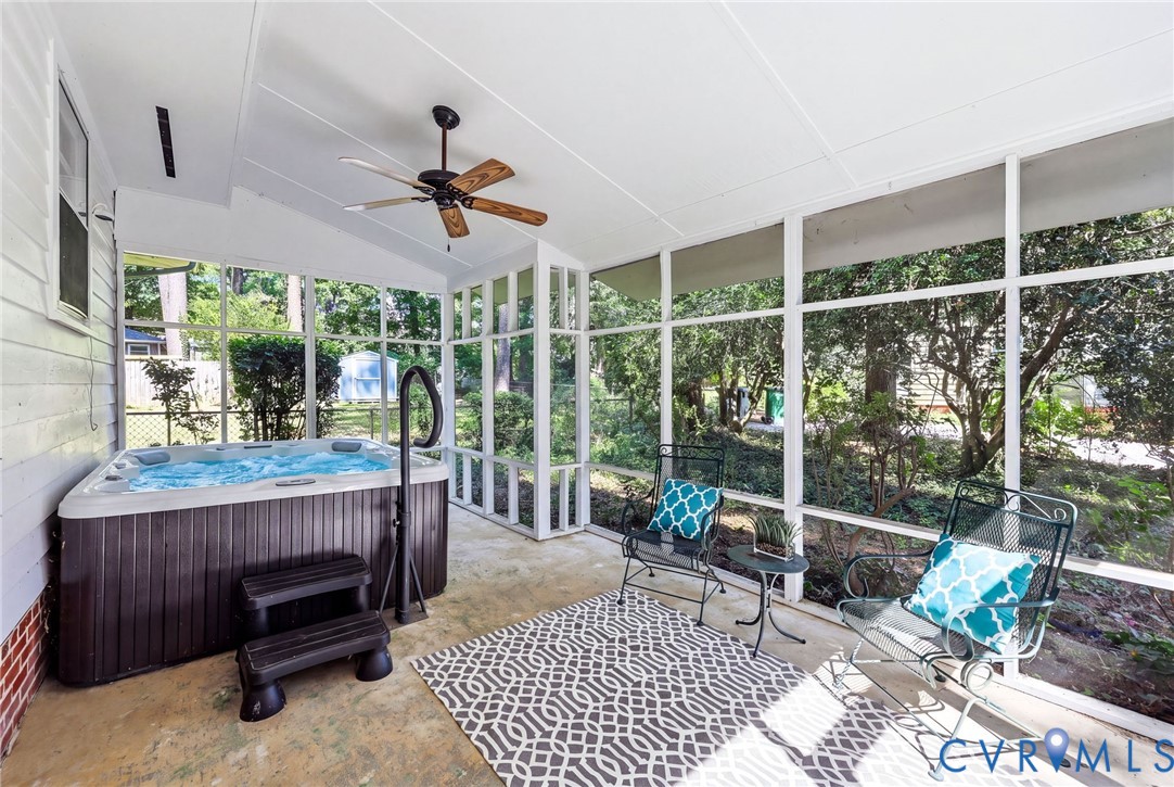 3400 Warner Road Richmond, VA 23225 - Photo 28 of 33 Screened patio featuring a hot tub, ceiling fan, a