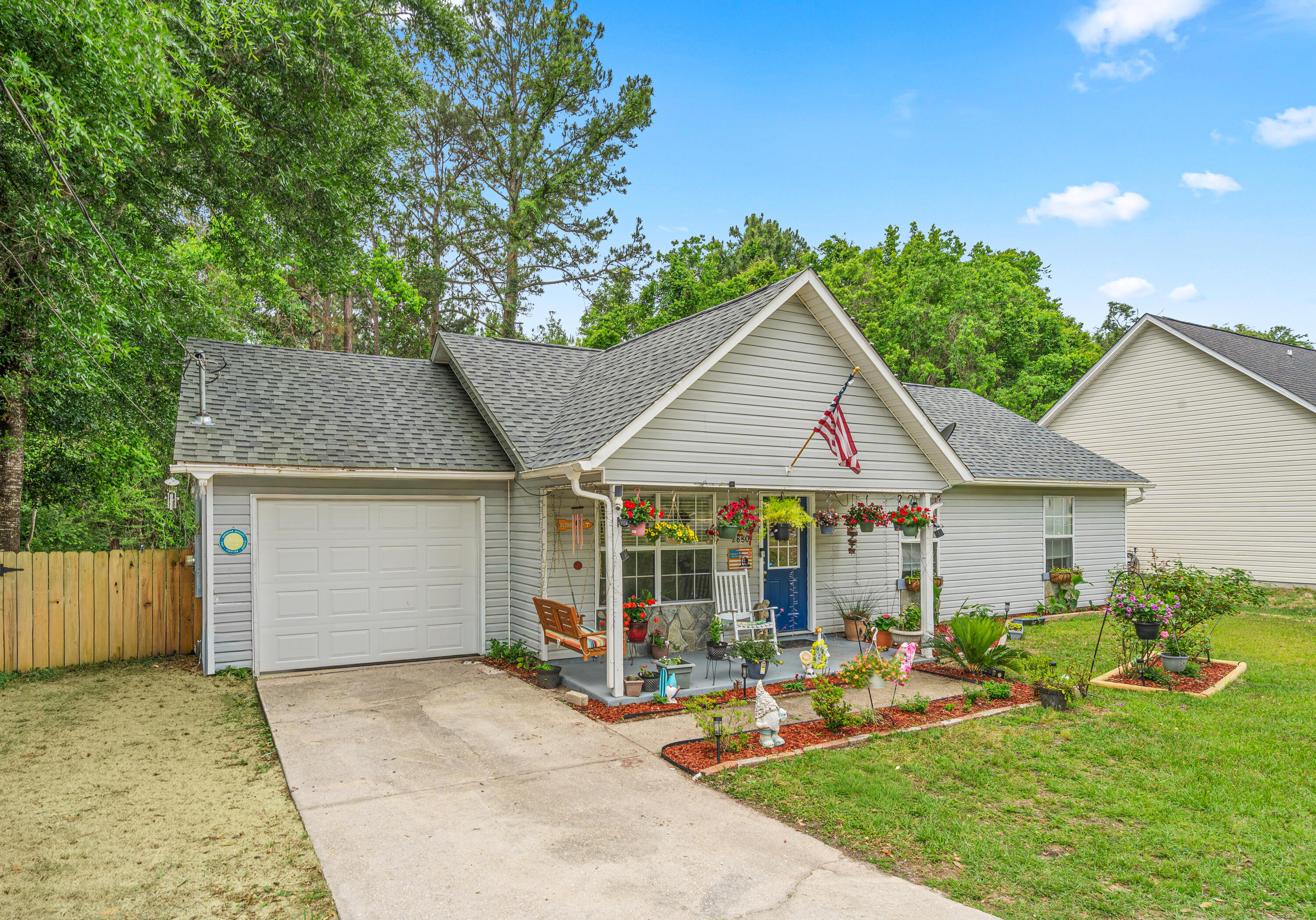 2880 Aplin Road Crestview, FL 32539 - Photo 4 of 33 a view of a house with backyard porch and sitting area