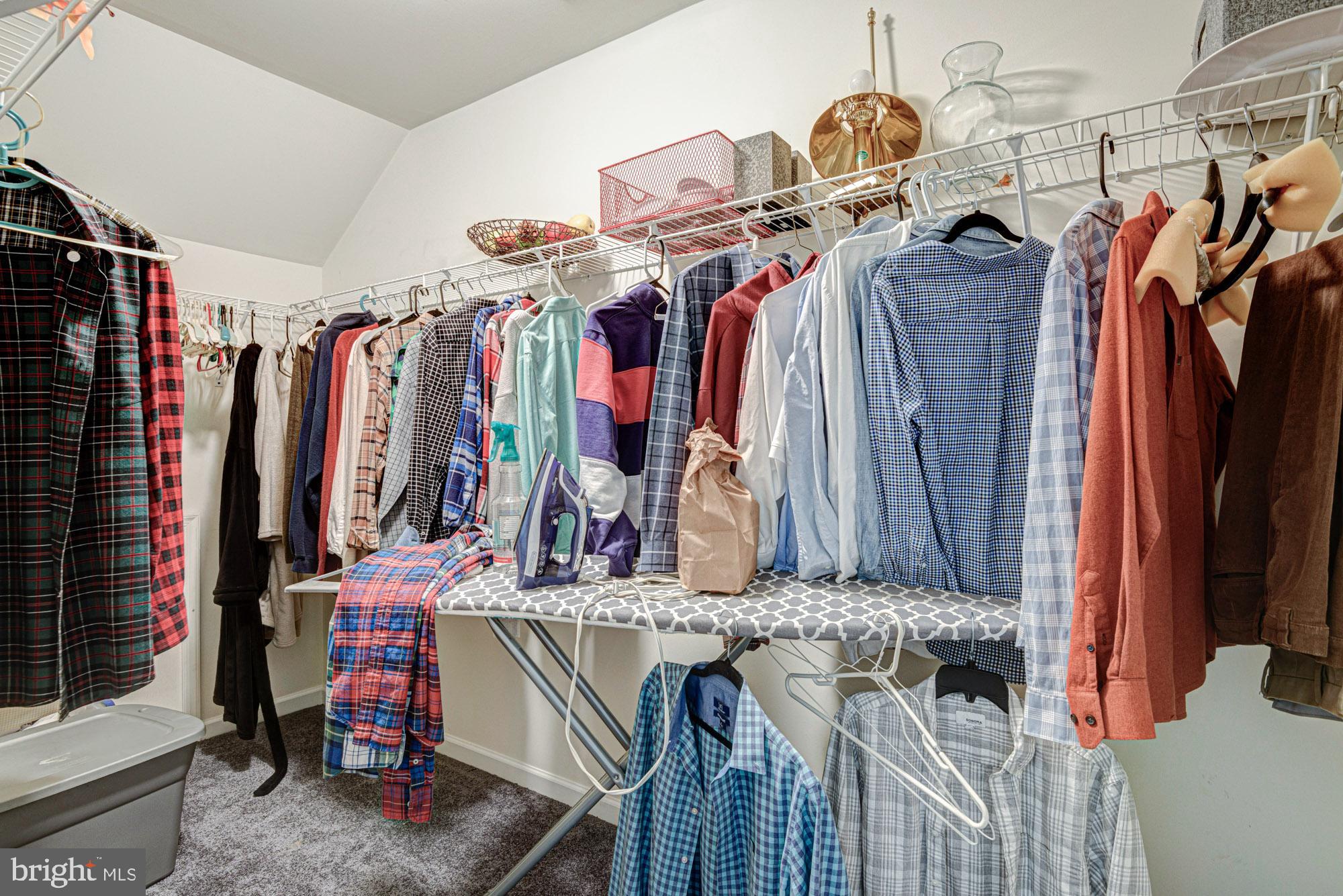 103 Candor Lane Dover, DE 19901 - Photo 21 of 38 a view of walk in closet with clothes