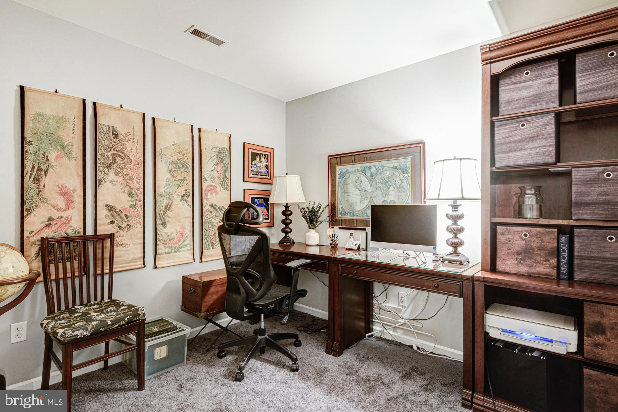 103 Candor Lane Dover, DE 19901 - Photo 24 of 38 a view of a workspace with furniture and a window