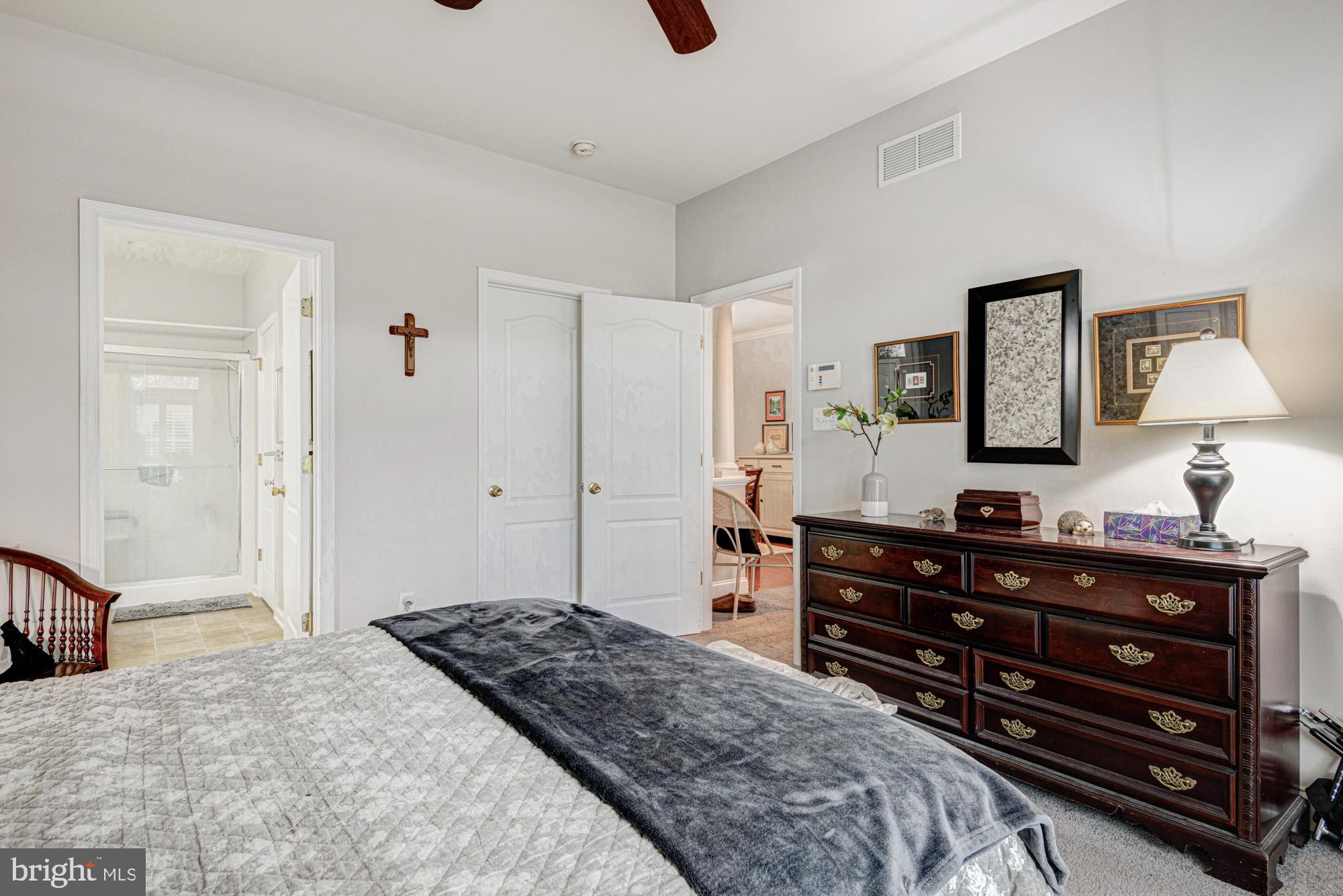 103 Candor Lane Dover, DE 19901 - Photo 28 of 38 a bedroom with a bed and a dresser