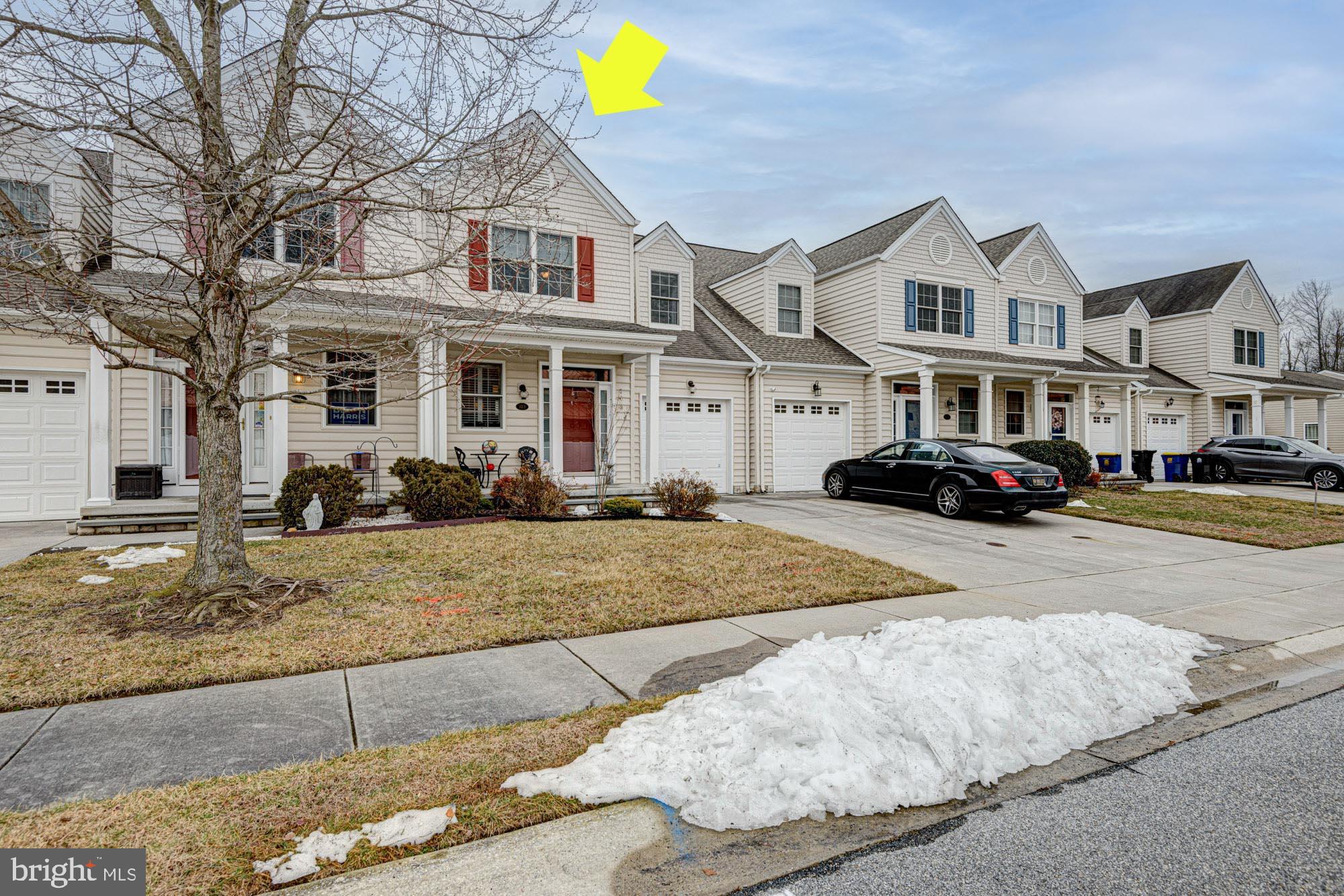 103 Candor Lane Dover, DE 19901 - Photo 8 of 38 a front view of a house with a yard