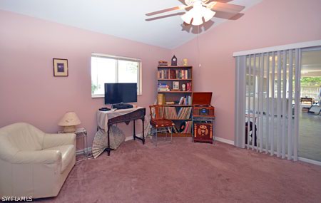 28 Michigan Road Lehigh Acres, FL 33936 - Photo 14 of 20 a view of a livingroom with furniture and a window