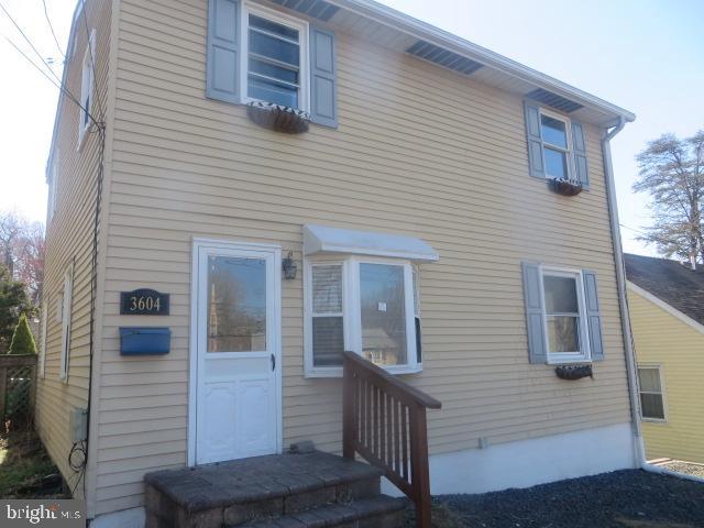 a view of a house with a porch