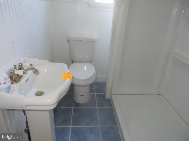 3604 Newportville Road Bristol, PA 19007 - Photo 7 of 13 a bathroom with a sink and toilet