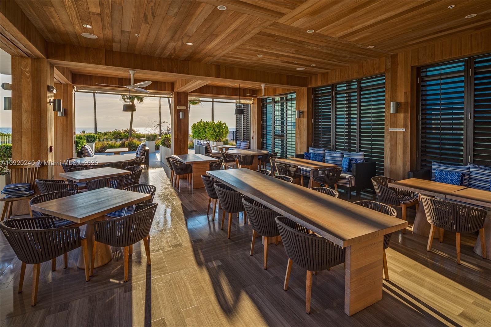 360 Ocean Drive, Unit 804S Key Biscayne, FL 33149 - Photo 40 of 49 a view of a kitchen with kitchen island granite countertop a large window