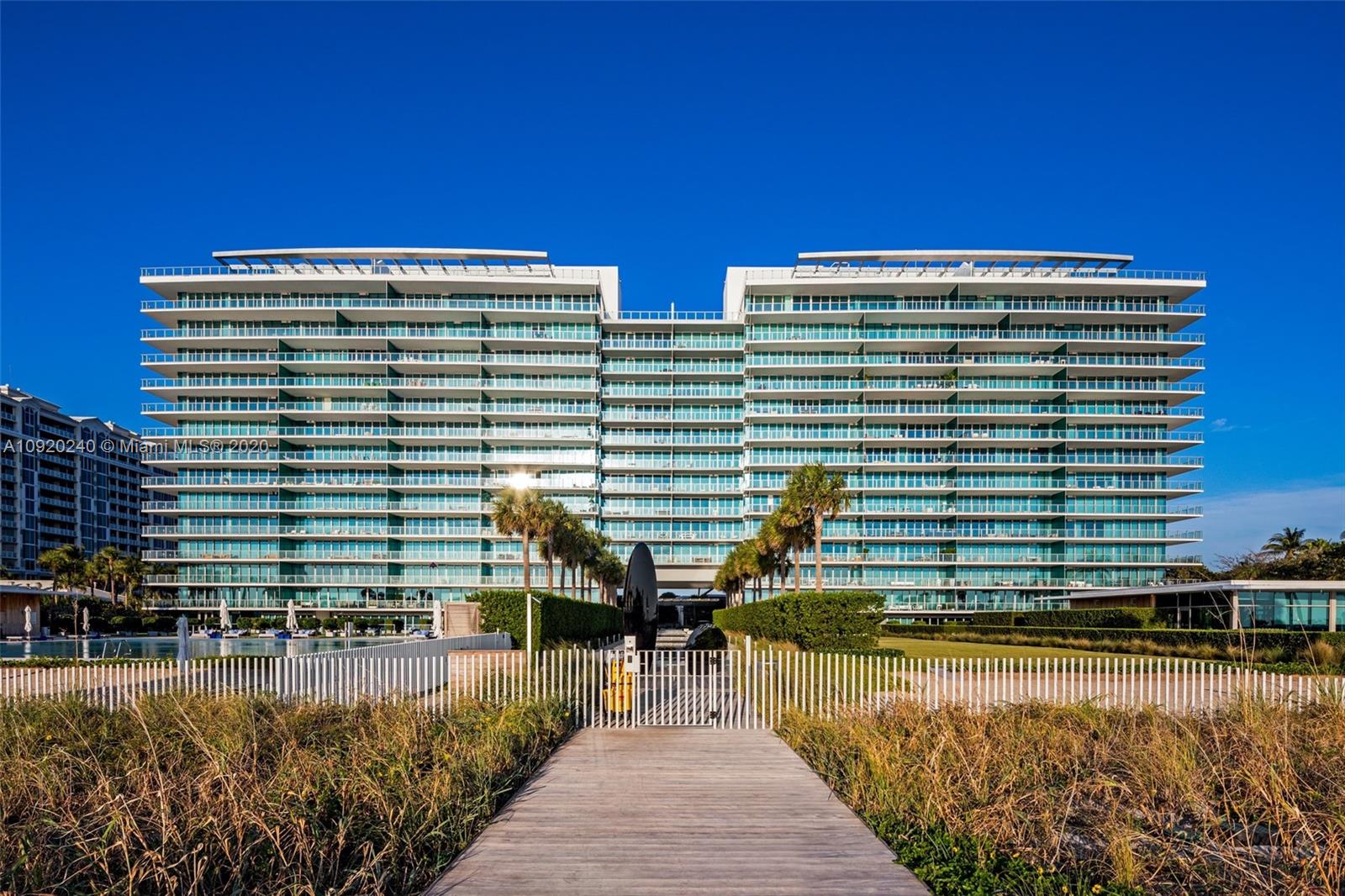 360 Ocean Drive, Unit 804S Key Biscayne, FL 33149 - Photo 45 of 49 a view of a balcony with two chairs