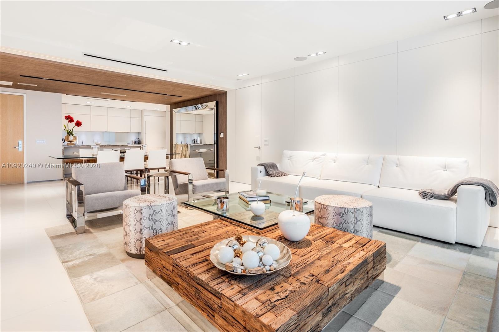 360 Ocean Drive, Unit 804S Key Biscayne, FL 33149 - Photo 8 of 49 a living room with furniture and a large window