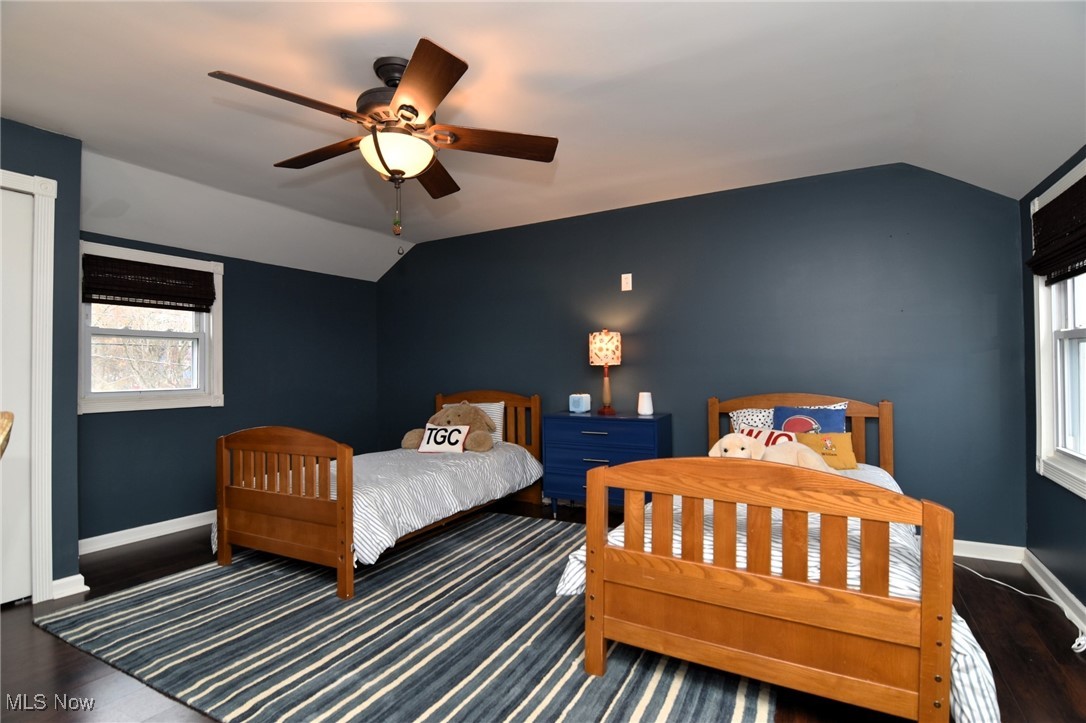 1767 Edgefield Road Lyndhurst, OH 44124 - Photo 13 of 17 Bedroom with dark hardwood / wood-style floors, vaulted ceiling, and ceiling fan