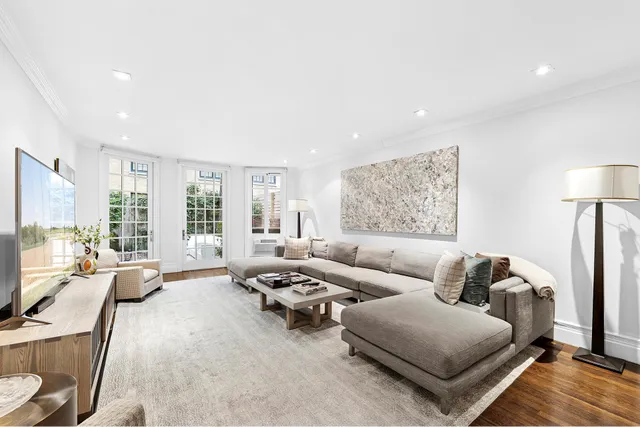 a black and white photo of a living room