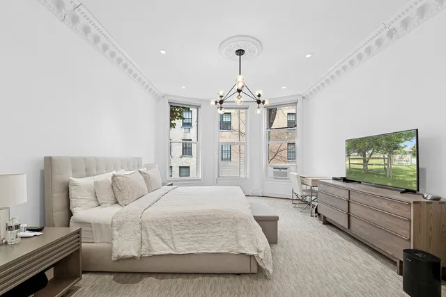 a black and white photo of a living room
