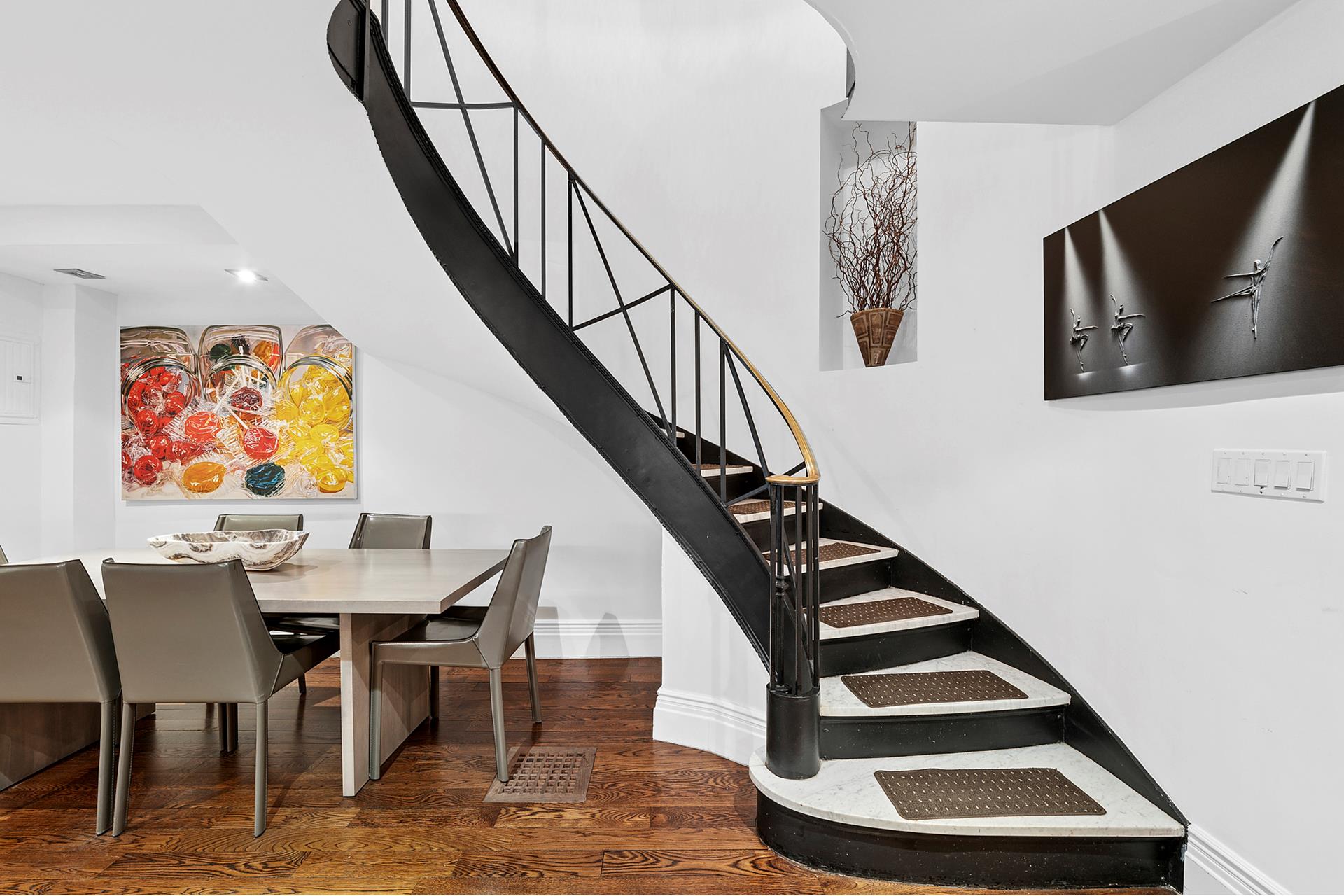165 East 71st Street Manhattan, NY 10021 - Photo 5 of 12 a view of entryway and hall with wooden floor