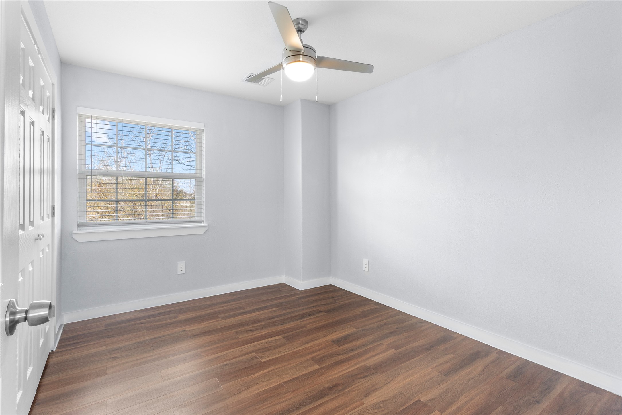 6809 Glass Street, Unit A Houston, TX 77016 - Photo 8 of 17 a view of a room with wooden floor and a window