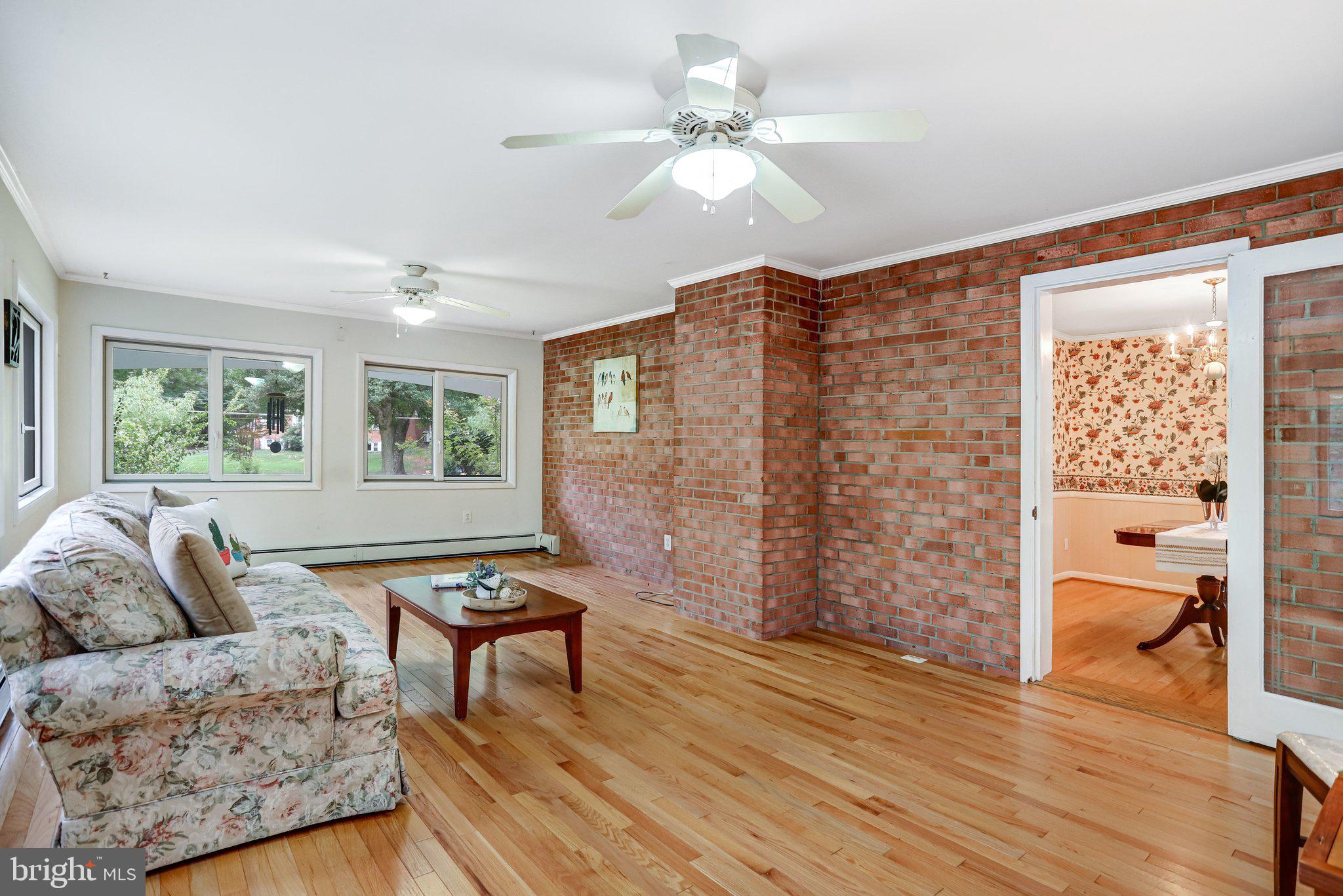 12830 Oxon Road Herndon, VA 20171 - Photo 20 of 61 A door from dining room opens to a Sunroom.