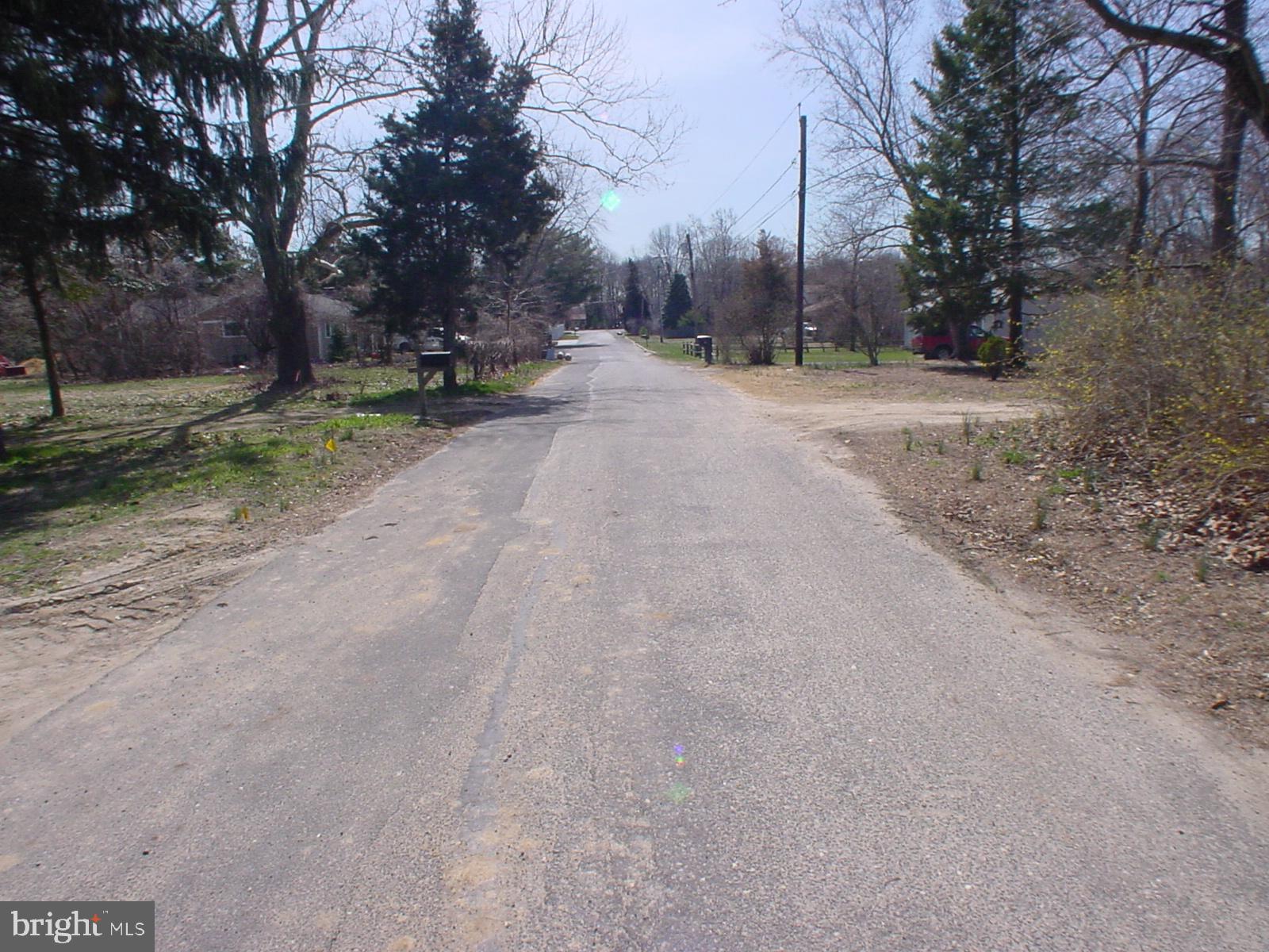 512 Garden Way Mount Laurel, NJ 08054 - Photo 2 of 5 a view of road with trees