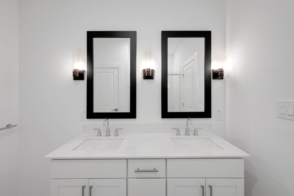 7914 Jasper Mdws Way Angleton, TX 77515 - Photo 18 of 33 Dual sinks and framed mirrors