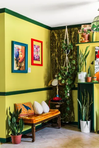 a view of a dining room with furniture and toys