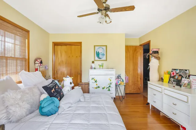 a view of balcony with wooden floor and outdoor seating
