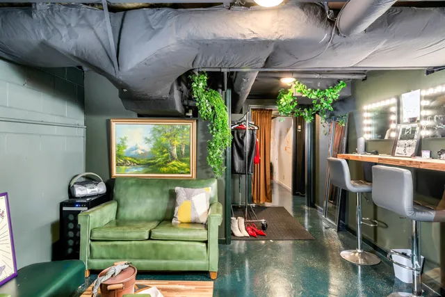 a white bath tub sitting next to a sink