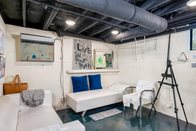 a view of a chairs and table in the patio