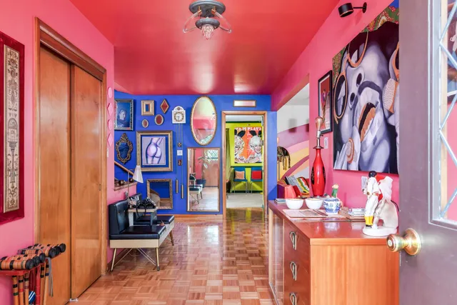 a group of people sitting outside of a building