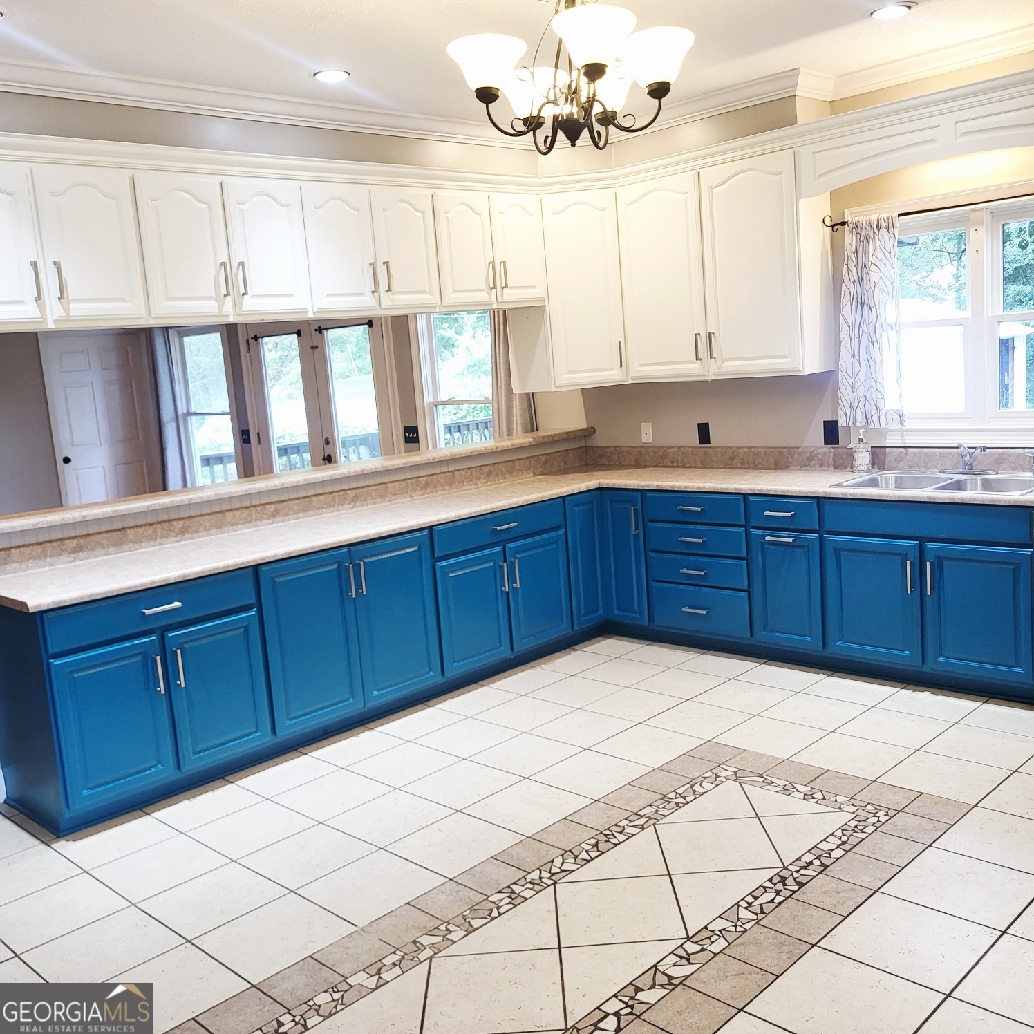 2012 29th Boulevard Valley, AL 36854 - Photo 12 of 29 a large kitchen with kitchen island granite countertop a white cabinets a sink and dishwasher