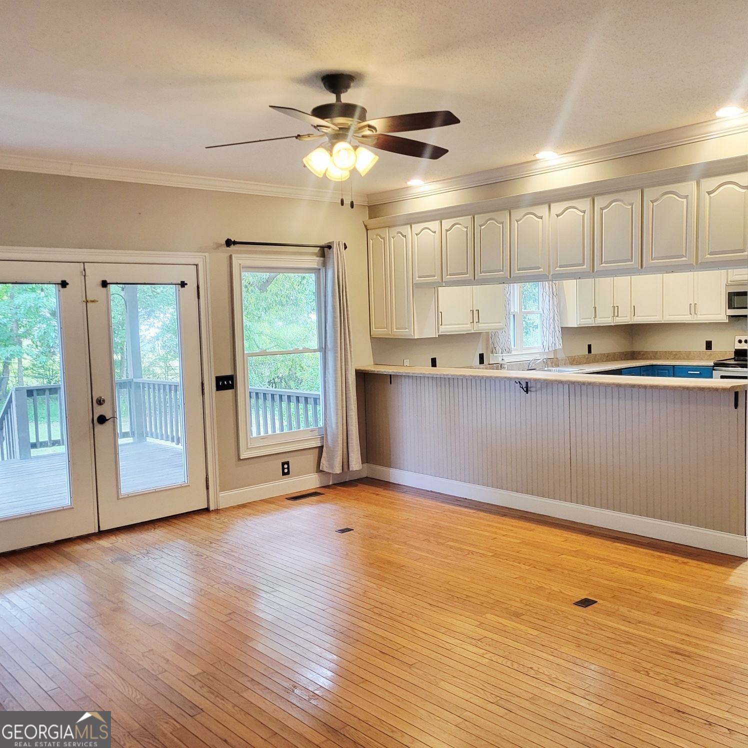 2012 29th Boulevard Valley, AL 36854 - Photo 16 of 29 a view of a kitchen with wooden floor and a window