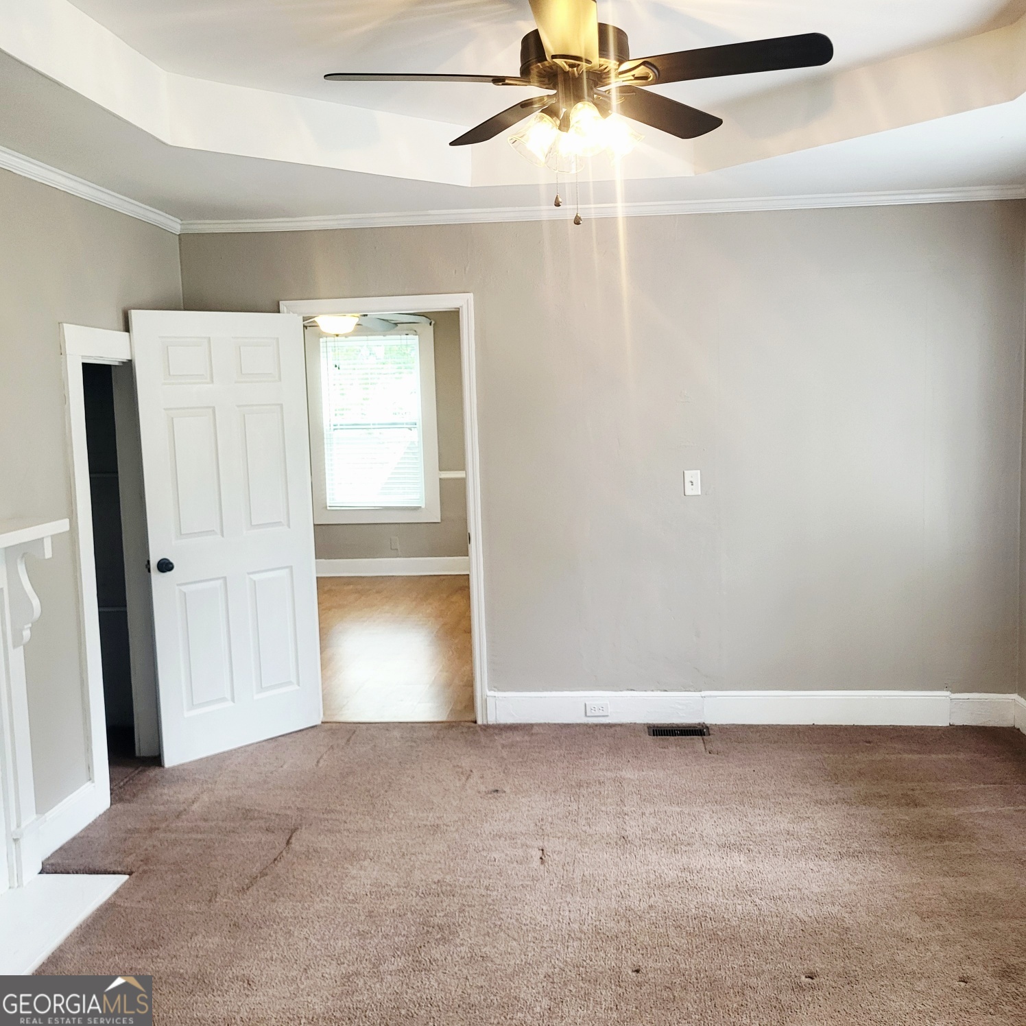 2012 29th Boulevard Valley, AL 36854 - Photo 20 of 29 an empty room with a ceiling fan and a window