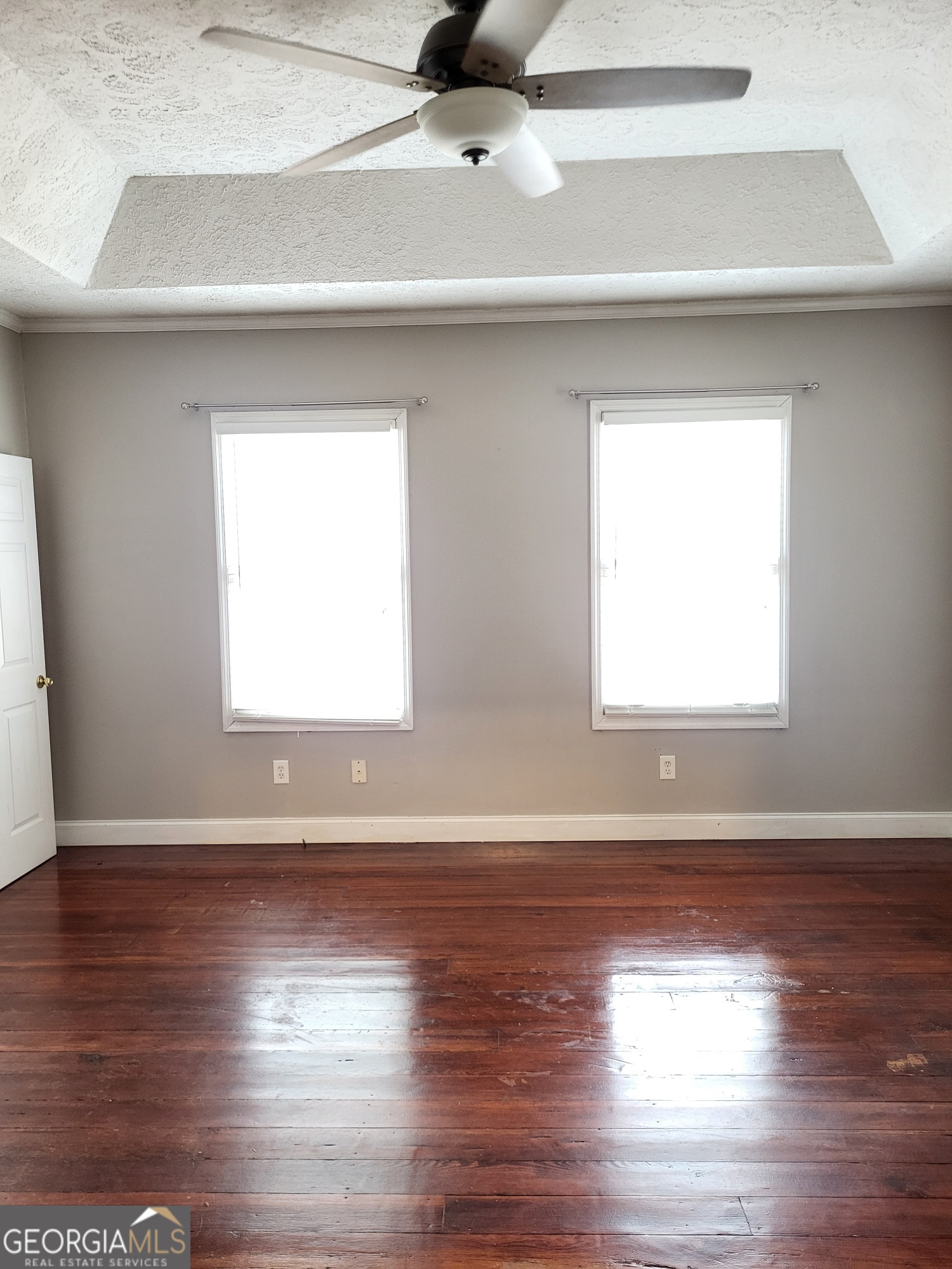 2012 29th Boulevard Valley, AL 36854 - Photo 21 of 29 a view of an empty room with wooden floor and a window