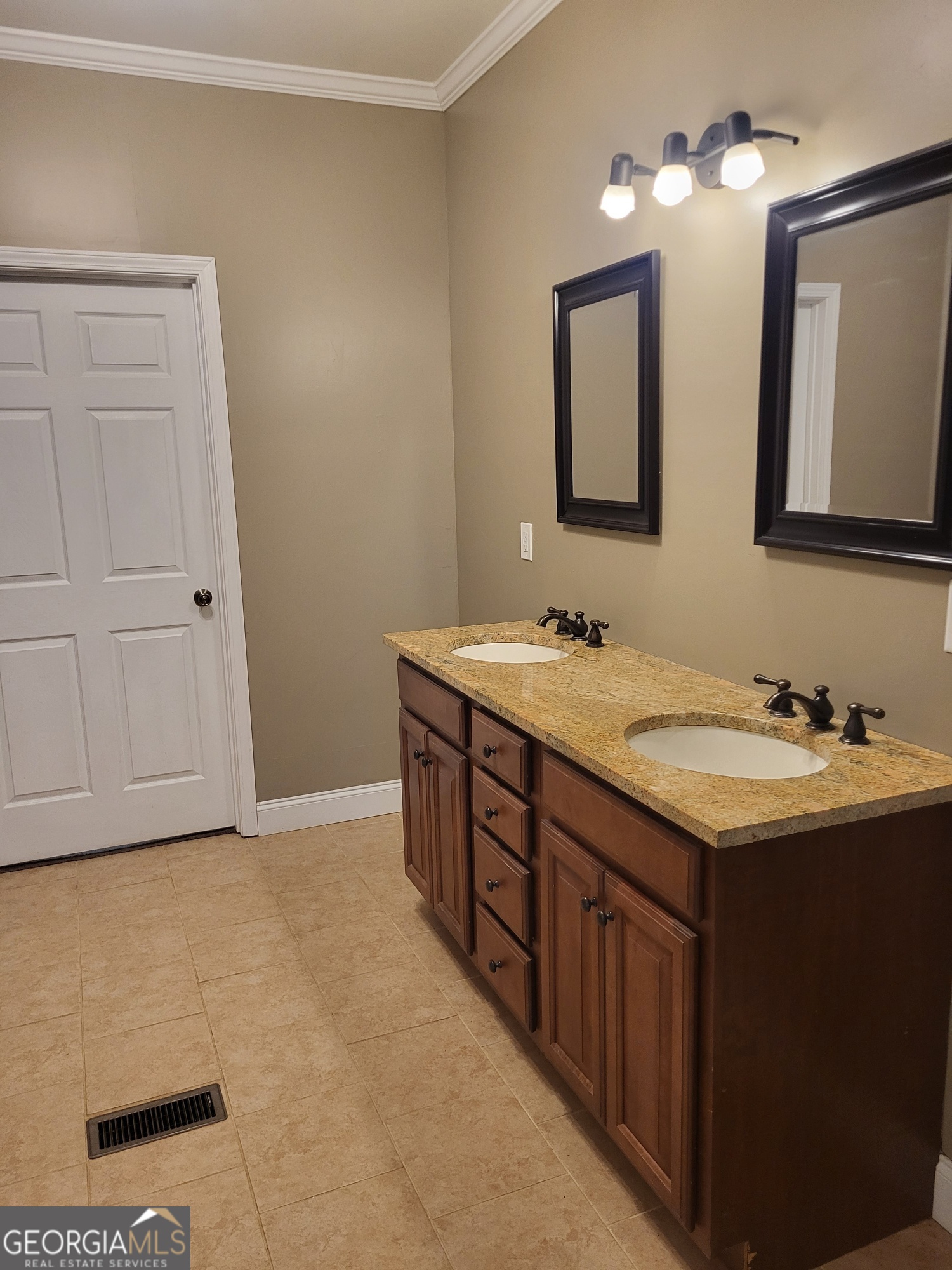 2012 29th Boulevard Valley, AL 36854 - Photo 23 of 29 a bathroom with a sink and a mirror