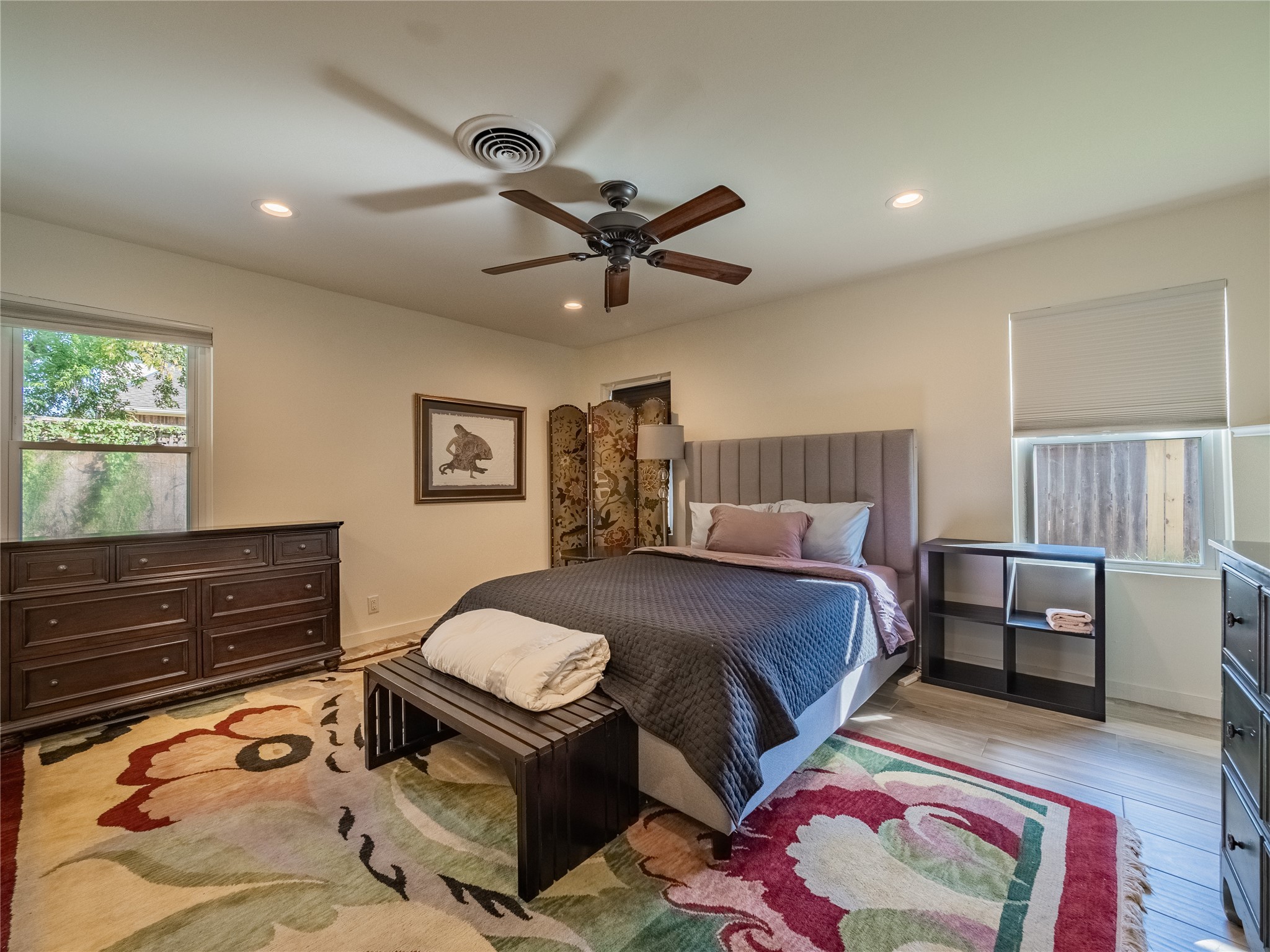 3010 Conway Street Houston, TX 77025 - Photo 14 of 21 a bedroom with a bed and wooden floor