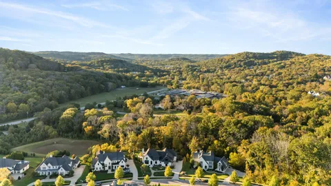 an aerial view of residential house with outdoor space