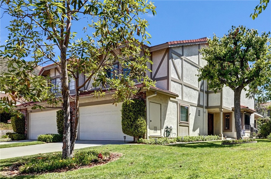 19605 Shadow Springs Way Porter Ranch, CA 91326 - Photo 1 of 33 Front and side of home.