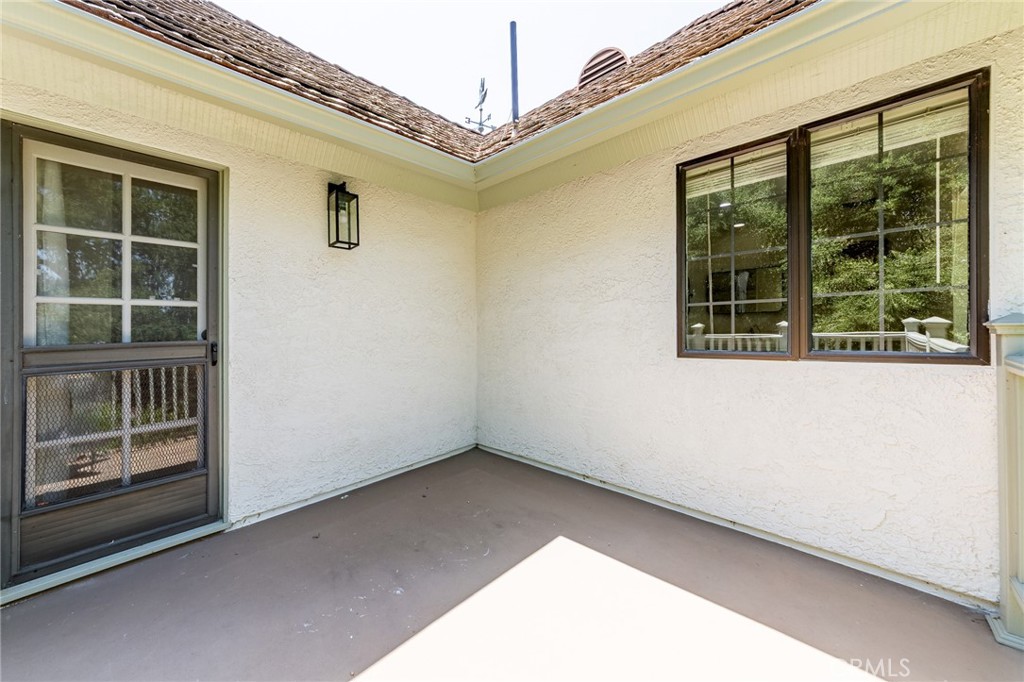 15601 Saddleback Road Canyon Country, CA 91387 - Photo 25 of 55 a view of an empty room with a window