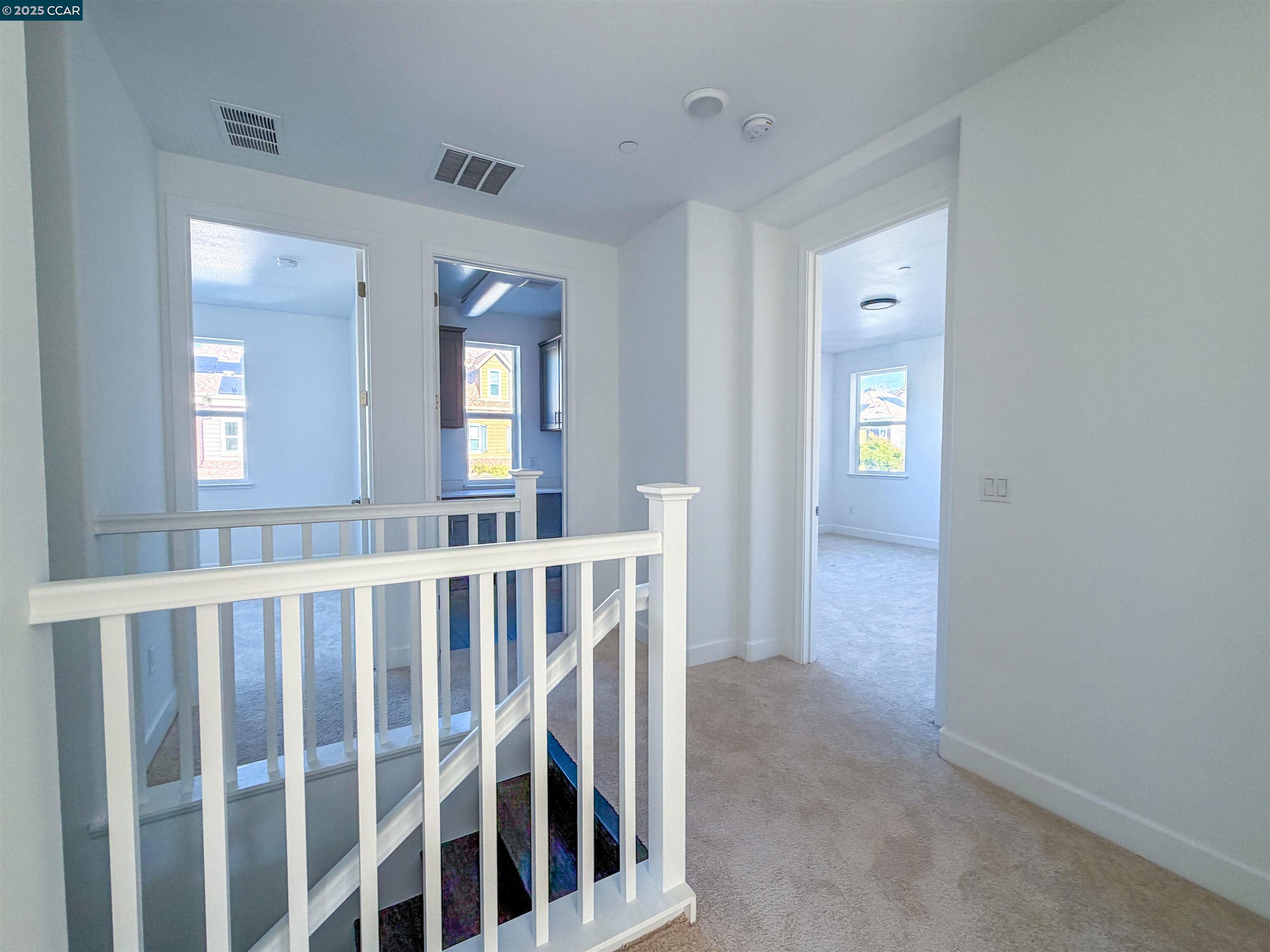 1861 Shasta Lane Hercules, CA 94547 - Photo 14 of 22 a view of an empty room with glass door and a window