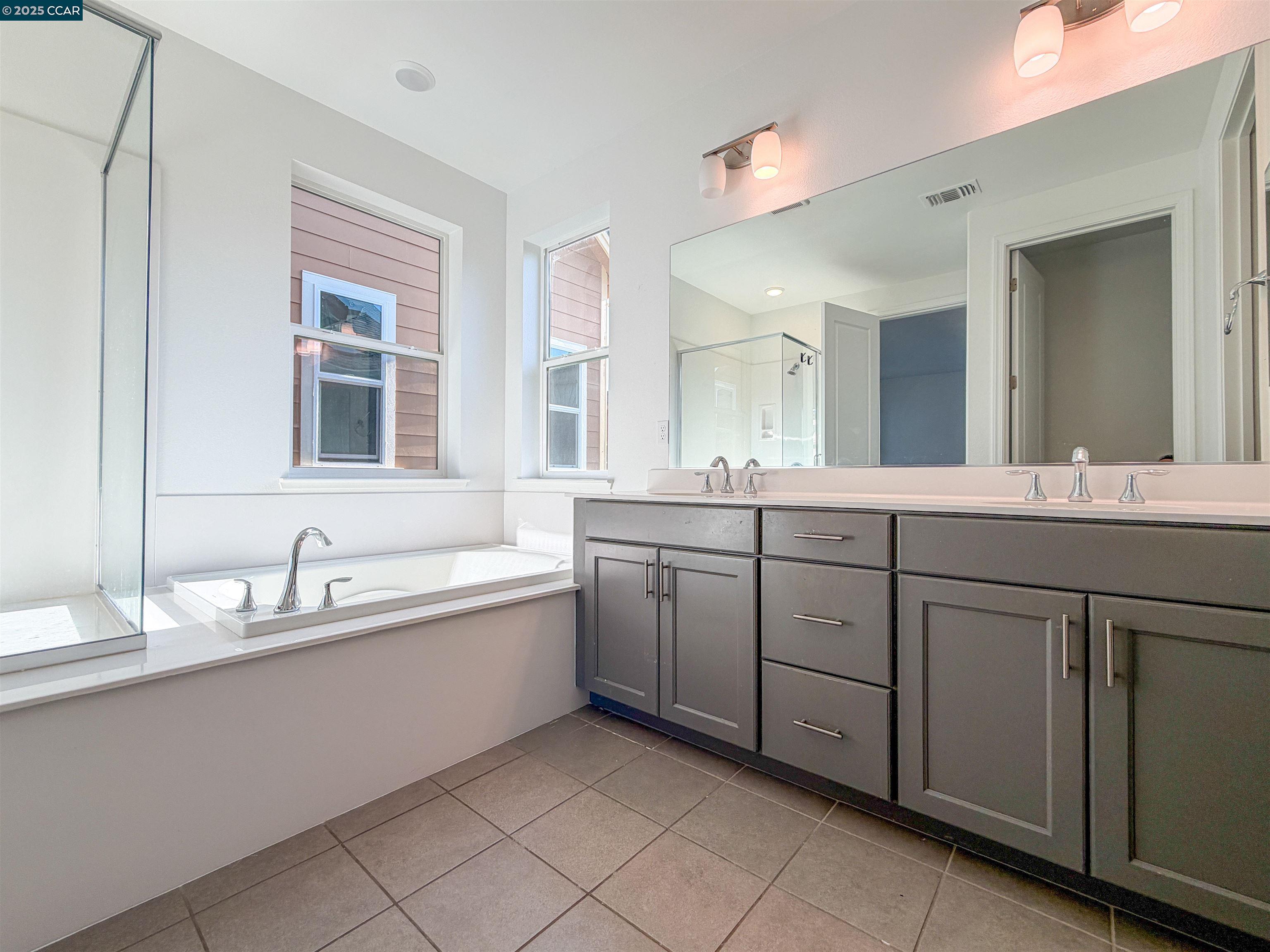 1861 Shasta Lane Hercules, CA 94547 - Photo 18 of 22 a bathroom with a granite countertop sink double and mirror