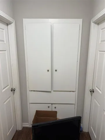 a bedroom with bed and window