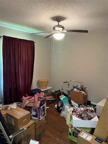 a room with furniture and wooden floor