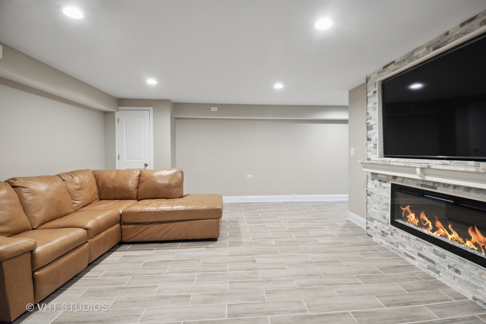 259 Fir Street Beecher, IL 60401 - Photo 27 of 38 a living room with furniture and a fireplace