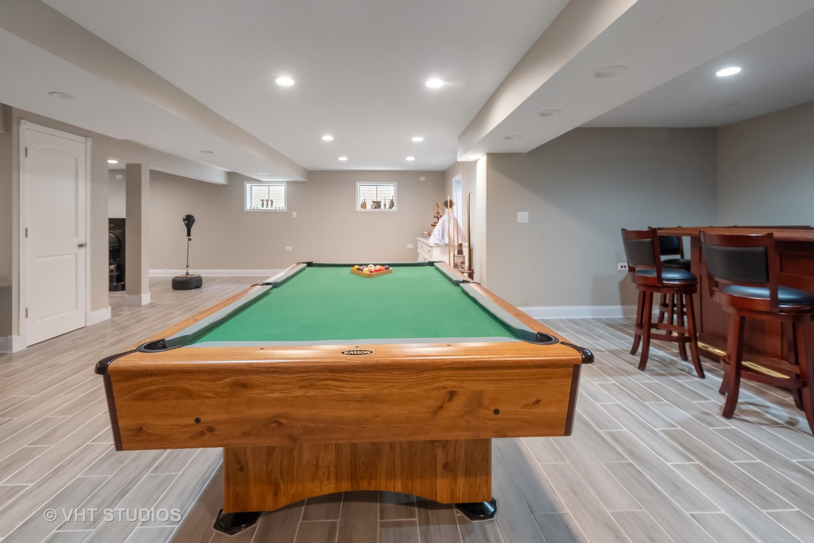 259 Fir Street Beecher, IL 60401 - Photo 30 of 38 a room with wooden floor pool table and chairs